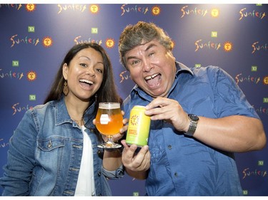 Sunfest executive director Alfredo Caxaj and daughter Mercedes Caxaj, Sunfest co-artistic director, are excited SunFest Cerveza, brewed by London Brewing Co-op, will make its debut at the music festival this summer. (DEREK RUTTAN, The London Free Press)