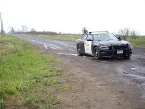 Lakeshore Line at Strafford Road was still closed Wednesday as the OPP continued their investigation into the discovery of human remains on a lakeside bluff at Port Burwell. (DEREK RUTTAN, The London Free Press)