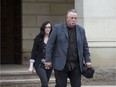 Craig Short and his daughter Bridgette Harding leave the Elgin County courthouse in St. Thomas on Monday, May 13 at the start of Short's third trial for the death of his wife Barbara Short. (Derek Ruttan/The London Free PresS)