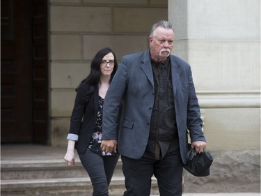 Craig Short and his daughter Bridgette Harding leave the Elgin County courthouse in St. Thomas on Monday at the start of Short's third trial for the death of his wife Barbara Short. (Derek Ruttan/The London Free PresS)