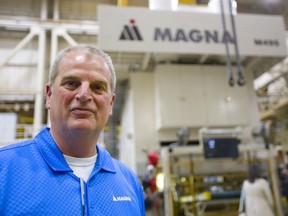 Presstran plant manager Brian Duivesteyn talks in St. Thomas Wednesday about its new 3,000-tonne press, which will allow the autoparts maker to stamp larger items made out of the new generation of stronger steels used to save weight in pickups and SUVs. (Mike Hensen/The London Free Press)
