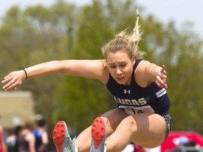 Chloe Knox of Lucas secondary school flies through the air as she competes in senior girls long jump at TVRA track and field meet on May 16 at TD Stadium in London. (Mike Hensen/The London Free Press)