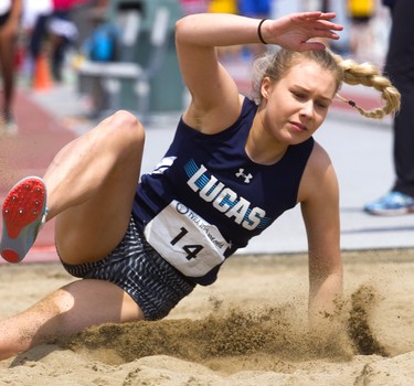 Chloe Knox, 19 of Lucas lands on her side as has become her habit as she competes with and against her younger sister Holly, 16 in senior girls longjump on the second day of the TVRA track and field meet at TD Stadium on Thursday May 16, 2019, Chloe won easily with a leap of 5.53m more than half a meter longer than Abbey Konopka of South who placed second.
Mike Hensen/The London Free Press/Postmedia Network