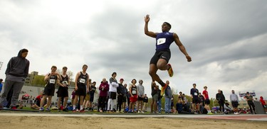 Devonte Ballantyne of CCH uses his speed to cover a lot of distance as he flys through a darkening sky Thursday May 16, 2019 during the senior boys long jump at TD stadium on the second day of the TVRA track and field meet.
Mike Hensen/The London Free Press/Postmedia Network