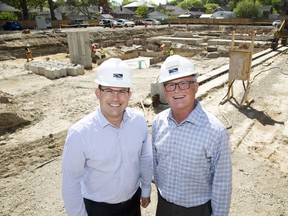 Bluestone Properties president Colin Bierbaum (left) and chairman and CEO Bernie Bierbaum on site of their latest project, a six story apartment building on Oakland Avenue in London. (Derek Ruttan/The London Free Press)