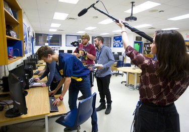 Matt Blain of London is helping Strathroy DCI students make a short film at their school. Blain was walking his assistant director of photography Eric Thompson through some shots he wanted, as Jhasna Rivas-Vasquez holds the boom mike over actor Mitchell Wolliston. (Mike Hensen/The London Free Press)