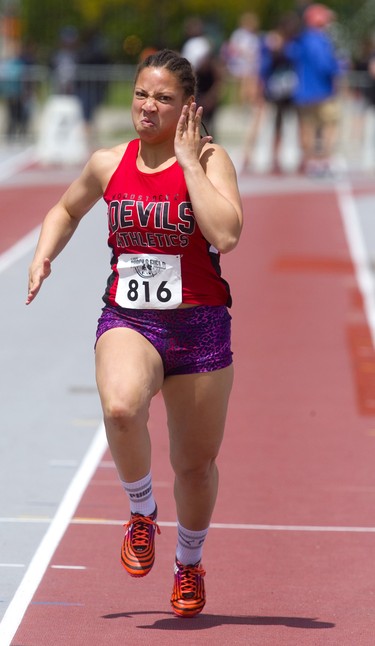Although she only had her shadow for company, Kyla Rodrigue of Woodstock CI gave it her all in the girls 100m for developmentally delayed at day 1 of WOSSAA at TD stadium.
Photograph taken on Thursday May 23, 2019. 
Mike Hensen/The London Free Press/Postmedia Network