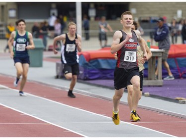 Evan Gillies of Lord Dorchester secondary school in Dorchester won his heat of the junior boys 800m race during the WOSSAA track and field championship at TD Stadium in London on Friday. (Derek Ruttan/The London Free Press)