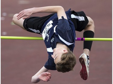 Joel Paluska of St. Mary's Catholic secondary school won the bronze medal by clearing 1.73m in the junior boys high jump during the WOSSAA track and field championship at TD Stadium in London on Friday. (Derek Ruttan/The London Free Press)