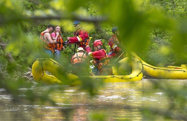 Members of the London Fire Department's marine unit rescued a man and woman from an island in the middle of Medway Creek after they falling out of their kayaks London on Sunday. (Derek Ruttan/The London Free Press)