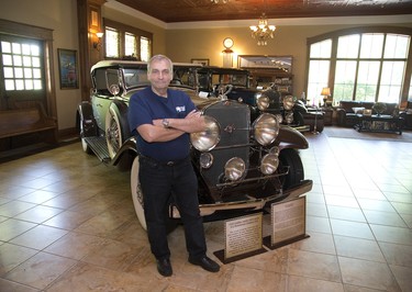 Steve Plunkett with two 1930 Cadillac series 452 luxury vehicles at his estate in London. (Derek Ruttan/The London Free Press)