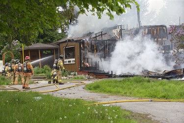 Fire destroyed a house at 6231 Colonel Talbot Road in London, Ont. on Thursday May 30, 2019. Derek Ruttan/The London Free Press/Postmedia Network
