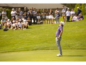 Charles Fitzsimmons, left, the final player for Western, needed to birdie the 18th, which was the first playoff hole for the men's team division in the Canadian University/College Championshiop at FireRock Friday, and hope that his competitor Andrew Harrison of UBC bogied. Fitzsimmons left his putt a good four to five feet short, and when Harrison drained his par putt, there was nothing to do but shake hands. Fitzsimmons did win the singles men's competition over teammate Jackson Bowery also on the first playoff hole. (Mike Hensen/The London Free Press)