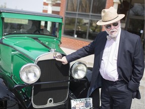 Michael Hunter poses with his 1928 Plymouth outside the Serbian Centre, Thursday, May 16, 2019. The Plymouth, built in Windsor, is the oldest in the world.