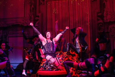 Dan Chameroy (centre) as Frank N. Furter with members of the company in The Rocky Horror Show.