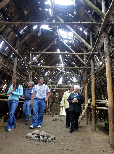 The Tracey family  Ashlan, left, Bob,Tyler, Gwen and Irene  tour a longhouse at Longwoods Conservation Area during yesterday's Shunpiker Mustery Tour. (London Free Press files)