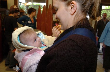 Tracey Mercer of London enjoyed her first Mother's Day with her three-month-old baby Madelynn Rose Payne on the 39th annual London Free Press Shunpiker Mystery Tour.  They are shown here  at  Cottage Curios and Garden operated by JoAnne and Ron Guille near Appin one of the tour stops. (London Free Press files)