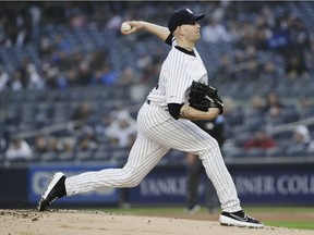 New York Yankees' James Paxton delivers a pitch during the first inning of the team's baseball game against the Minnesota Twins on Friday, May 3, 2019, in New York.