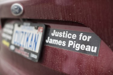 Toronto, ONT.: May 30, 2019 -- A sticker commemorating the fight to get justice for James Pigeau, who died at Elgin-Middlesex Detention Centre, on the car of Judy Struthers and her husband Glen Struthers. The pair's adopted son Justin Struthers died at Elgin-Middlesex Detention Centre on Boxing Day, 2017. Toronto, Ont., May 30, 2019. (Nick Kozak for Postmedia News). ORG XMIT: POS1905301825310782
