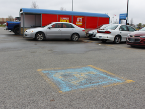 Police said the hit-and-run incident occurred between an accessible parking spot and the cart return area of the Walmart parking lot on Sunday, May 12, 2019 in Stratford, Ont. (Terry Bridge/Postmedia Network)