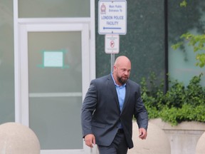 Const. Wesley Reeves leaves London police headquarters. (Free Press file photo)