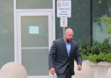 Const. Wesley Reeves leaves the police headquarters on Dundas Street in London Wednesday after appearing at a Police Services Act hearing on 12 professional misconduct charges. Reeves has been suspended from the force since April 2017. DALE CARRUTHERS / THE LONDON FREE PRESS