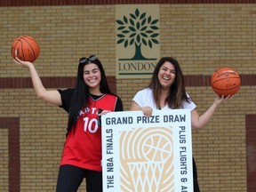 Sarah Farrugia, left, and her mother, Jane, are going to Game 5 of the NBA finals in Toronto on Monday after the elder Farrugia selected the winning basketball in a give-away sponsored by Google and NBA at Victoria Park in London on Sunday, June 9, 2019. (DALE CARRUTHERS, The London Free Press)