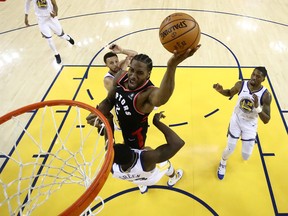 Kawhi Leonard #2 of the Toronto Raptors attempts a shot against the Golden State Warriors during Game Three of the 2019 NBA Finals at ORACLE Arena on June 05, 2019 in Oakland, California.