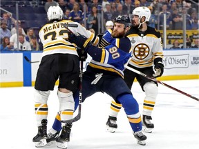 Charlie McAvoy (73) of the Bruins and Clinton native Ryan O'Reilly collide during the third period of Game 6 of the Stanley Cup Final on Sunday night.