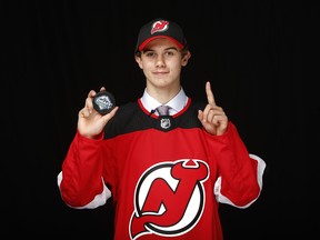 Jack Hughes poses for a portrait after being selected first overall by the New Jersey Devils during the first round of the 2019 NHL Draft at Rogers Arena on June 21, 2019 in Vancouver, Canada. (Photo by Kevin Light/Getty Images)