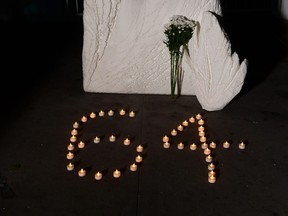 A wreath of flowers and candles reading the numbers 64 are placed in front of the Chinese Consulate in Los Angeles, California on June 4, 2019, as people gathered to commemorate the 30th anniversary of what has generally been known as the Tiananmen Square massacre. (Photo by Frederic J. BROWN / AFP)FREDERIC J. BROWN/AFP/Getty Images