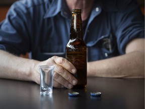 A man drinks a beer in a Windsor bar. Much attention has been paid to the opioid crisis allowing alcohol abuse to fly under the radar in recent years.
