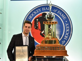 Evan Bouchard of the London Knights was presented with the Max Kaminsky Trophy as the Most Outstanding Defencemena at  the 2018-19 OHL Awards Ceremony at the Hockey Hall of Fame in Toronto on Wednesday June 5, 2019. (Photo by Aaron Bell/CHL Images)