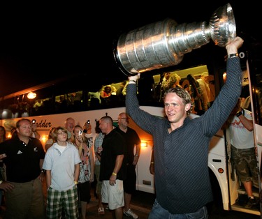 Former Knights star Corey Perry of the Anaheim Ducks proudly parades the Stanley Cup into a downtown London bar last night for a private party with his family and his London friends. Perry and the Cup spent the day in his hometown of Peterborough. The Knights sent their team bus to pick up Perry’s family and friends to deliver them to London. “It’s everything I’ve dreamed about and I’m not going to forget this day, for sure,” Perry said before heading to London. The Cup will be leaving the area today, but only for a few hours. Perry’s Ducks teammate Andy McDonald is flying it to Colgate University in Hamilton, N.Y., before turning around and bringing it back to the West Middlesex Memorial Centre in his hometown of Strathroy for a public event from 2:30 p.m to 5:30 p.m.