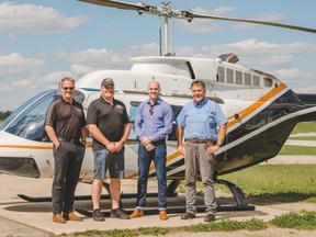 Nick Booth (Operations Manager, GLH), Jeremy Rood (Company Pilot, GLH), Grant Sparling II (Cowbell Brewing Co.) and Bill Leyburne (Owner, GLH)