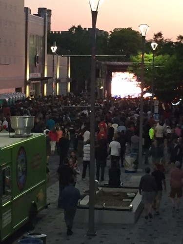 A crowd gathers at London's Jurassic Park on Dundas Place on Friday, June 7, 2019. (Free Press staff)