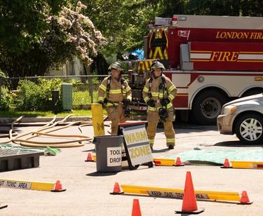 London police and firefighters had to be decontaminated after entering a suspected drug lab in a townhouse complex near London's eastern edge, on Hamilton Road near Gore Road. Photo taken Wednesday June 12, 2019. (Max Martin/The London Free Press)