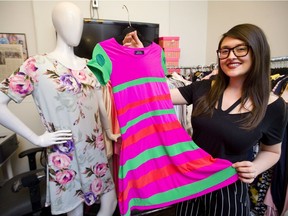 Nicole Snobelen of London shows a special dress she made four years ago for a young girl in hospital, as part of her Abby Fund, which she named after her father. Snobelen, since that has made 105 special outfits for free to give to children in hospitals, as part of her business. Libro has given her space in its small business incubator on York Street in London.  (Mike Hensen/The London Free Press)