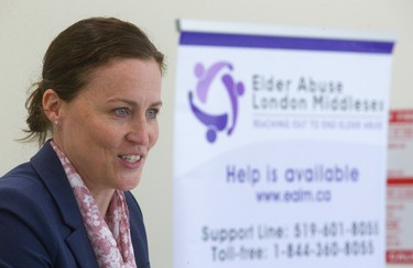 London police Det. Amanda Pfeffer speaks Friday after receiving the Brian Young Award for efforts to combat elder abuse as part of her work fighting financial crime. (Mike Hensen/The London Free Press)