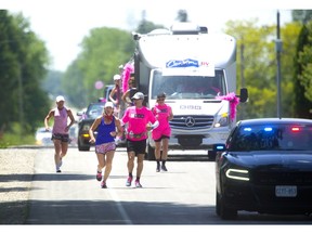 London's Theresa Carriere heads for Strathroy during her 100-kilometre Onerun fundraiser for cancer care on Friday, June 14, 2019. (Mike Hensen/The London Free Press)