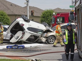 A three vehicle collision at the intersection of Gainsborough Road and Coronation Drive sent four people to hospital in London. (Derek Ruttan/The London Free Press)
