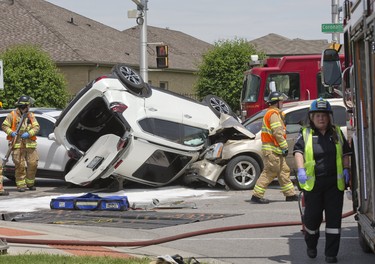 A three vehicle collision at the intersection of Gainsborough Road and Coronation Drive sent four people to hospital in London. (Derek Ruttan/The London Free Press)