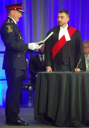 New London police chief Steve Williams takes his oath of office at the London Convention Centre  on Wednesday June 19, 2019 as he becomes the 20th London police chief as chief John Pare retires.  Mike Hensen/The London Free Press/Postmedia Network