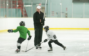 NHLer and former London Knight forward Corey Perry surprised players on the Oakridge Aeros minor novice hockey team by joining in their practice at Medway Arena in London on Thursday December 13, 2012. CRAIG GLOVER The London Free Press