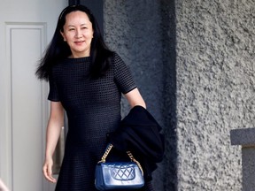 Huawei's financial chief Meng Wanzhou leaves her family home in Vancouver in May 8. She is battled extradition to the United States through Canadian courts, while China ratchets up pressure on Canada.