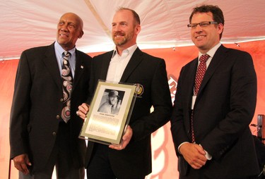 Sportsnet's Hazel Mae emceed the Canadian Baseball Hall of Fame induction ceremony Saturday in St. Marys. Cory Smith/The Beacon Herald

Fergie Jenkins presents Rob Thomson with his Canadian Baseball Hall of Fame jacket Saturday in St. Marys. Cory Smith/The Beacon Herald

Philadelphia Phillies bench coach Rob Thomson, who lives in Sebringville, was one of four inductees into the Canadian Baseball Hall of Fame Saturday in St. Marys. Cory Smith/The Beacon Herald

The family of Rob Thomson (Michele, Chrissy and Jacquie) look on during Thomson's induction speech. Cory Smith/The Beacon Herald

Ryan Dempster kisses his eight-month-old daughter, Isabella, while his wife Kelly watches Saturday's induction ceremony. Cory Smith/The Beacon Herald

Former all-star pitcher Ryan Dempster was one of four inductees into the Canadian Baseball Hall of Fame Saturday in St. Marys. Cory Smith/The Beacon Herald

Former all-star pitcher Ryan Dempster, middle, was one of four inductees into the Canadian Baseball Hall of Fame Saturday in St. Marys. Also pictured are Fergie Jenkins, left, and hall of fame board chair Adam Stephens. (Cory Smith/Postmedia Network)