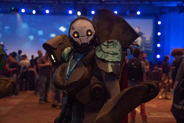 A costume of a Warframe character by Henchmen Studios, a special-effects shop in Toronto, is modelled at TennoCon Saturday. The outfit took a team of eight people more than three weeks to make. More than 2,000 people attend TennoCon, an annual convention at London's convention centre, RBC Place, Saturday which celebrates Warframe, a video game developed by London company Digital Extremes.  (MAX MARTIN, The London Free Press)