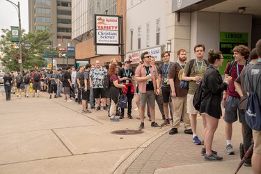 The line-up of fans -- some of whom arrived as early at 4 a.m. -- stretches along Wellington Street toward King Street Saturday waiting for the 11 a.m. opening of TennoCon, an annual convention of gamers hosted by Digital Extremes at London's convention centre, RBC Place.(MAX MARTIN, The London Free Press)