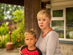 Dakota Millen, and her son Ocean, 6, outside of a women's shelter in London, Ont. where they are staying as Millen said they are unable to find affordable housing in the city. If she can't find a place in three weeks, Millen said they will be moved to a shelter outside the city. (MAX MARTIN, The London Free Press)