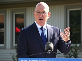 Municipal Affairs and Housing Minister Steve Clark speaks outside the Good Shepherd's Lodge in Sarnia Tuesday. Clark's visit highlighted previously announced provincial funding and the importance of partnerships in addressing an affordable housing shortage. Tyler Kula/Sarnia Observer/Postmedia Network